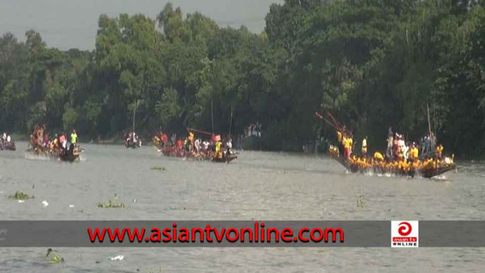 মুকসুদপুরে মধুমতি নদীতে ঐতিহ্যবাহী নৌকাবাইচ প্রতিযোগিতা অনুষ্ঠিত