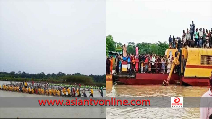 নৌকাবাইচ দেখতে উৎসুক জনতার ভিড়