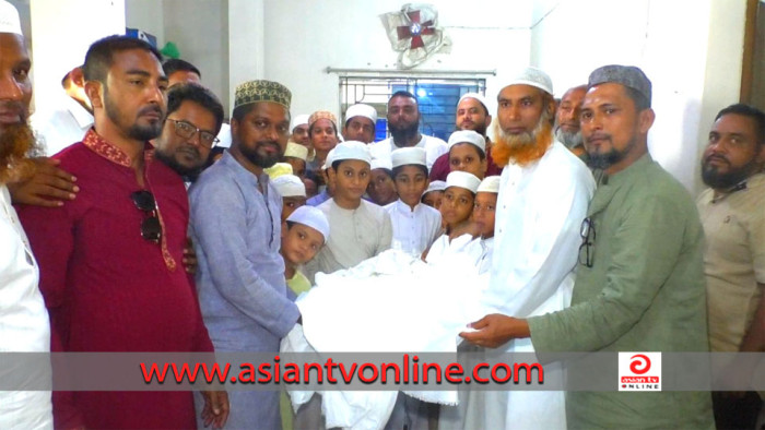 খালেদা জিয়া দেশে ফেরায় মাদ্রাসা শিক্ষার্থীদের মাঝে খাবারের আয়োজন ও কাপড় বিতরণ